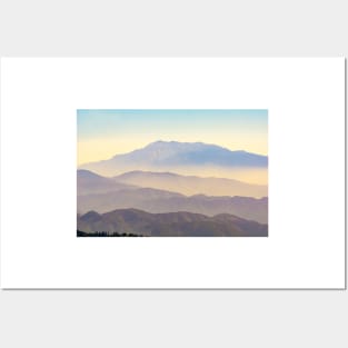 Mountain layers rising to distant peak through hazy light and different color bands. Posters and Art